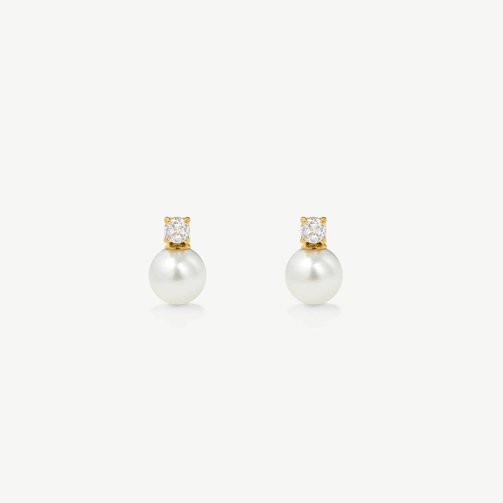 Pair of elegant gold stud earrings with white pearls and clear crystal accents